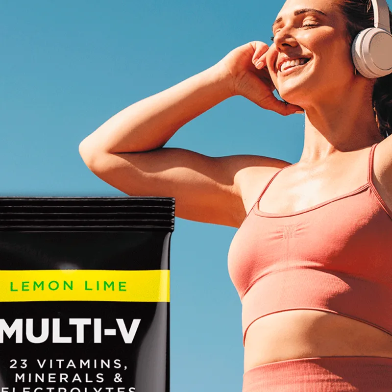 Athlete in sunlight with a Lemon-Lime MULTI-V stick pack